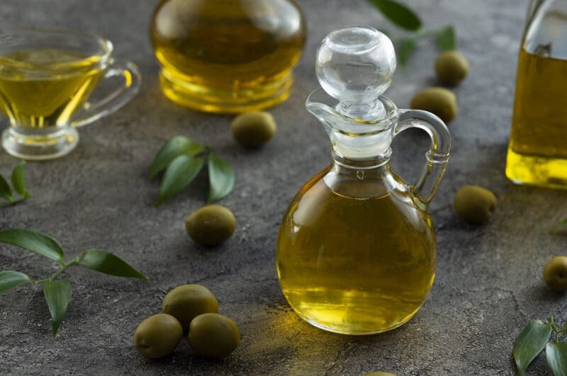 - high view bottles filled with olive oil marble background - ภาพที่ 3