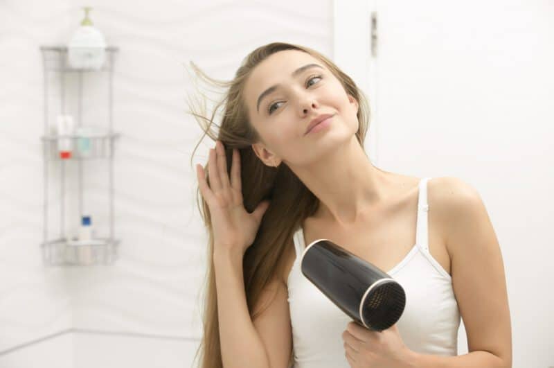 - beautiful young woman looking mirror drying hair - ภาพที่ 7