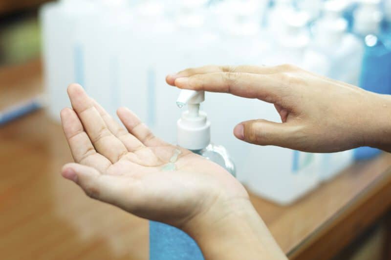 - woman cleaning hands with hand sanitizer gel prevent coronavirus contamination - ภาพที่ 9