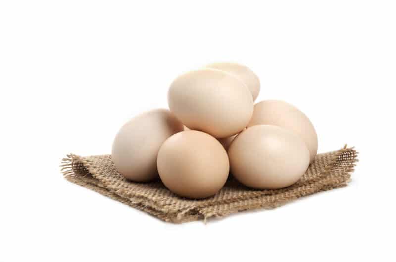 - three fresh organic raw eggs isolated white surface - ภาพที่ 3