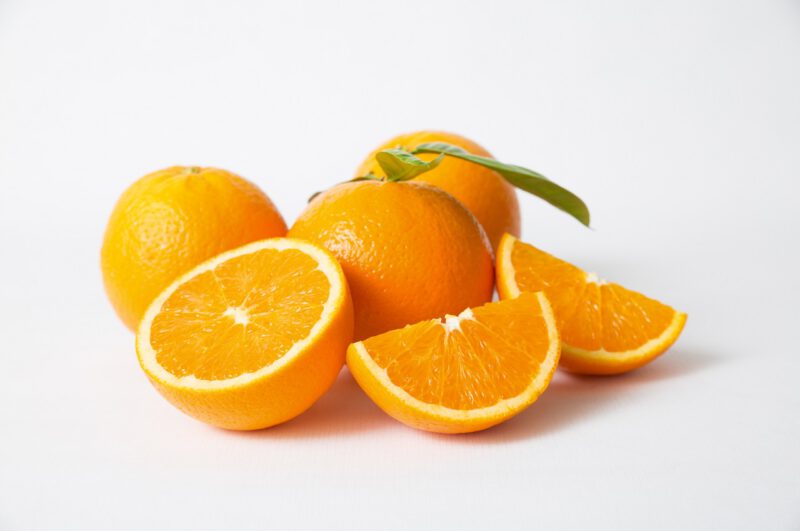สครับปาก - cut whole orange fruits with green leaves - ภาพที่ 7