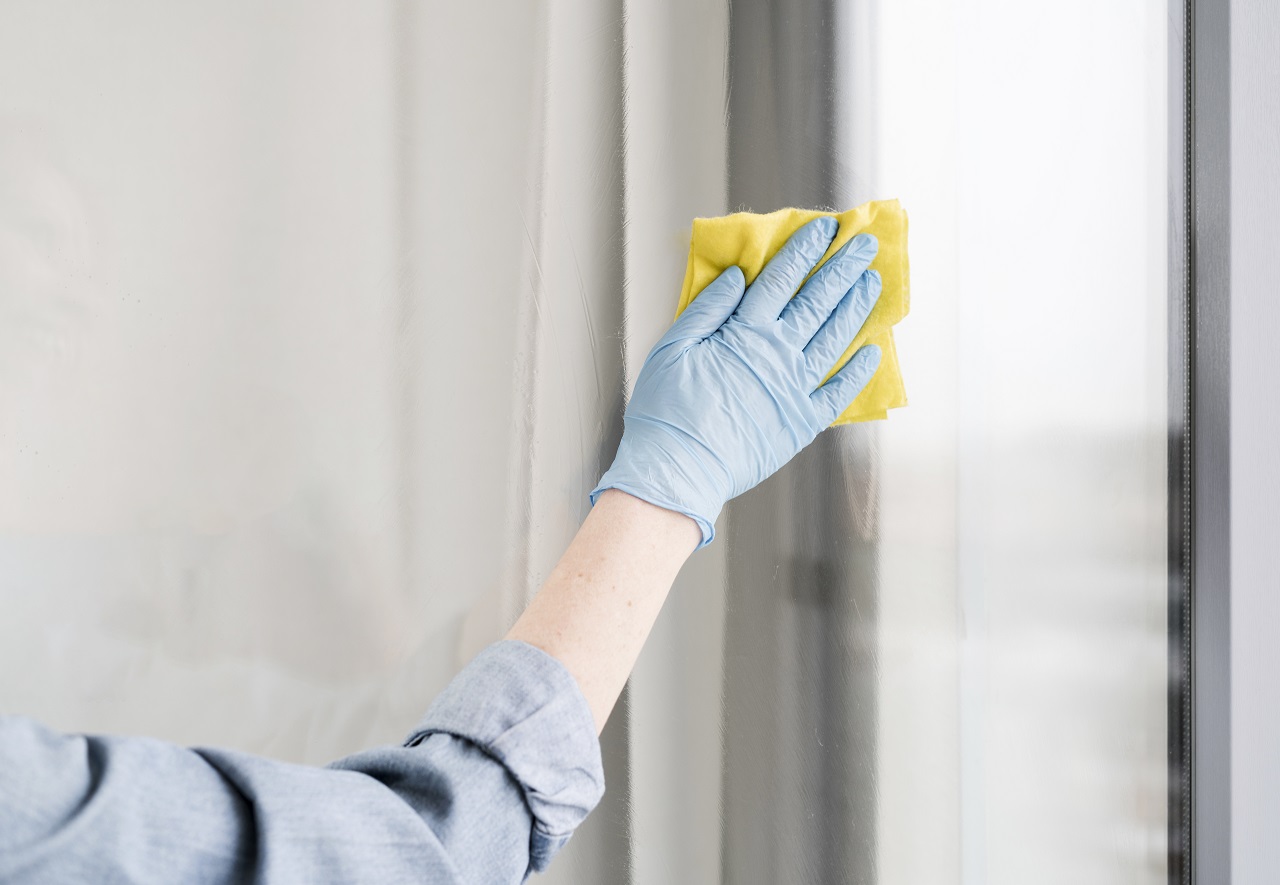 ทำความสะอาดบ้าน - woman with rubber glove wiping window - ภาพที่ 7