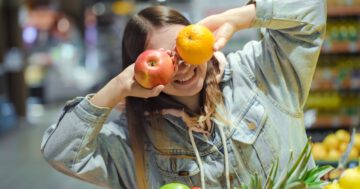 เมนูอกไก่ - young woman with fruit her hands supermarket Large - ภาพที่ 3