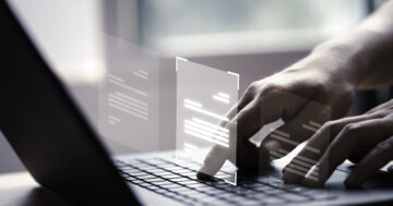 ข้อมูลสารสนเทศ - hand using laptop computer with virtual screen document online approve paperless quality assurance erp management concept - ภาพที่ 1